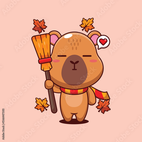Cute capybara holding broom in autumn day cartoon vector illustration