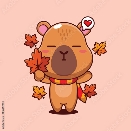 Cute capybara holding maple leaf in autumn cartoon vector illustration