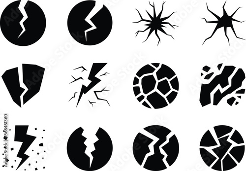 Collection of black cracked and broken graphic elements on white background