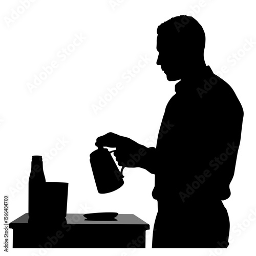 Man holding a coffee pot while standing at a countertop silhouette  