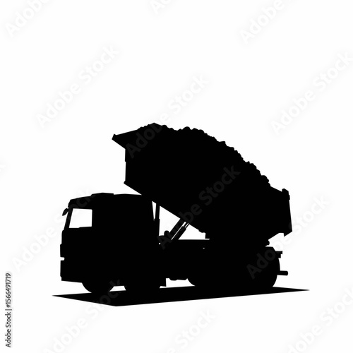 Silhouette of a dump truck carrying a load of material.