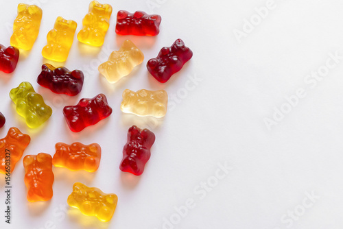 Colorful different Haribo gummy bears on white background