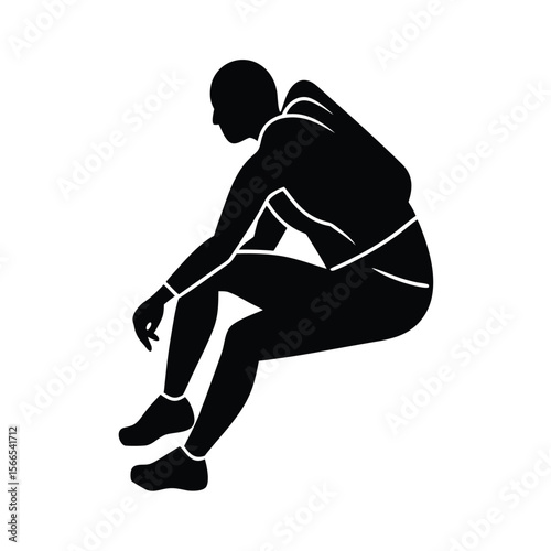 Black silhouette of person resting with arms on knees