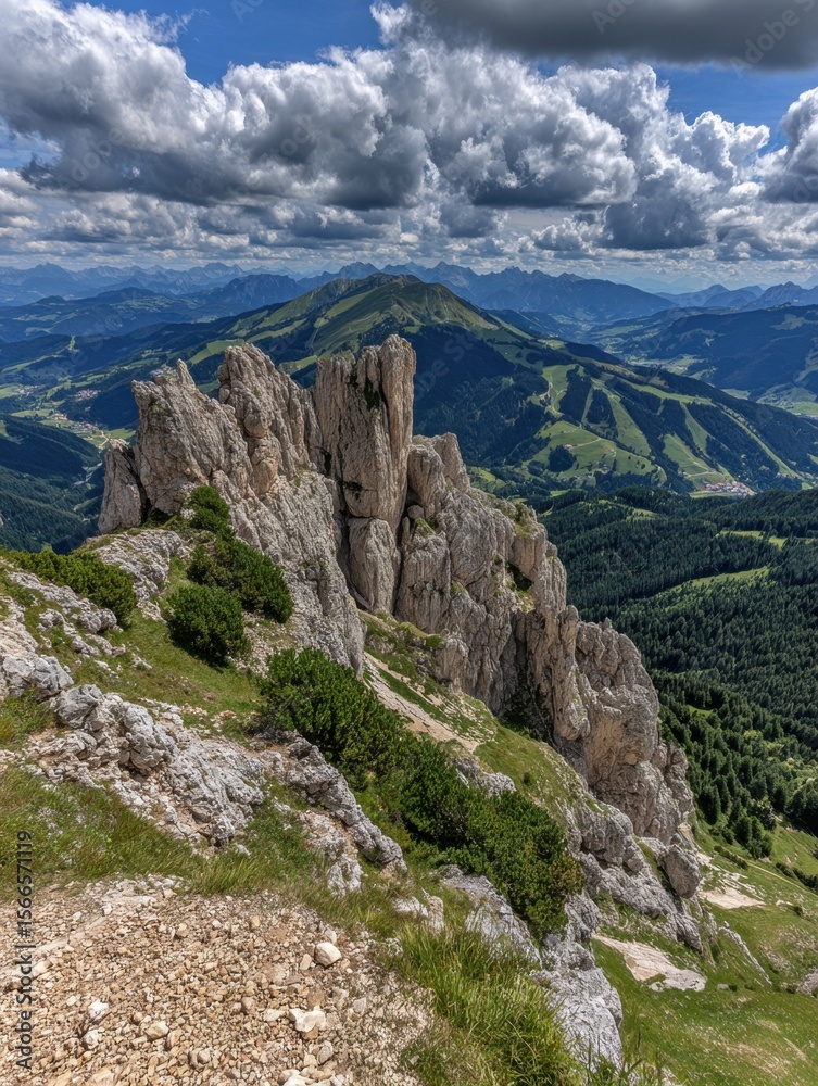 Fototapeta premium A Vast Mountain Range Unfurls Under a Sky of Dramatic Clouds