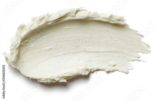 Creamy, off-white cosmetic balm texture , elegantly swirled and textured against a bright white background, ideal for beauty and skincare