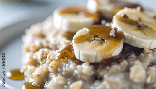a, porridge, oats, with, bananas, banana, pieces, food, honey, running, new, modern, beautiful, closeup, breakfast, bowl, meal, dish, healthy, fresh, millet, corns, creamy, couscous, Marple, sirup