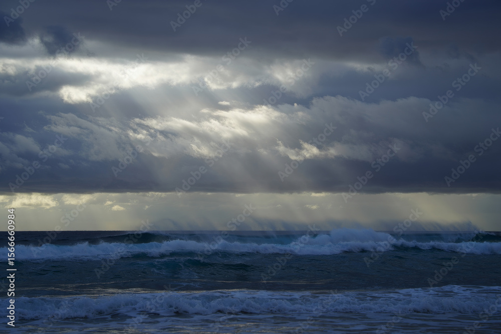 Dramatic Ocean Waves and Sunbeams Breaking Through Storm Clouds; Moody Seascape Photography Dramatic Ocean Waves and Sunbeams Breaking Through Storm Clouds; Moody Seascape Photography