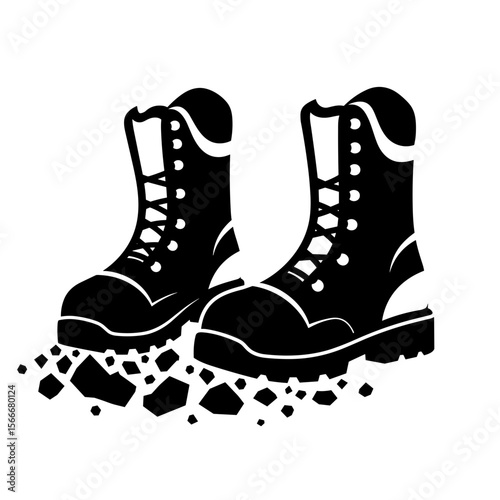 Hiking boots leaving footprints on rugged terrain  