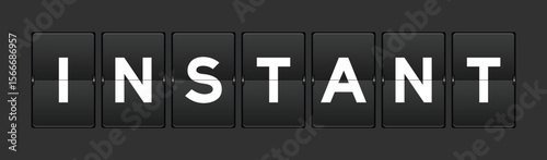 Black color analog flip board with word instant on gray background