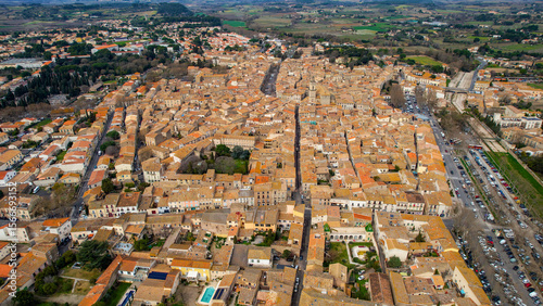 Fototapeta Naklejka Na Ścianę i Meble -  Aerial view of the old town of Pezenas in France on a sunny afternoon in spring.