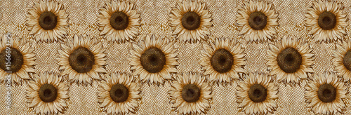 Charming vintage sunflowers seamlessly adorning a textured fabric with delicate stripes and chevrons in sepia tones