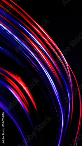 Vibrant red and blue light trails create dynamic curved lines against dark background