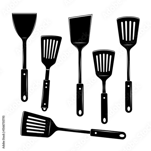A collection of various kitchen spatulas isolated on white background