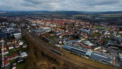 Fototapeta Naklejka Na Ścianę i Meble -  Aerial view of the downtown of the city Alsfeld, 36304 in Germany on a sunny afternoon in autumn