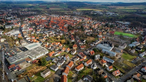 Fototapeta Naklejka Na Ścianę i Meble -  Aerial view of the downtown of the city Alsfeld, 36304 in Germany on a sunny afternoon in autumn