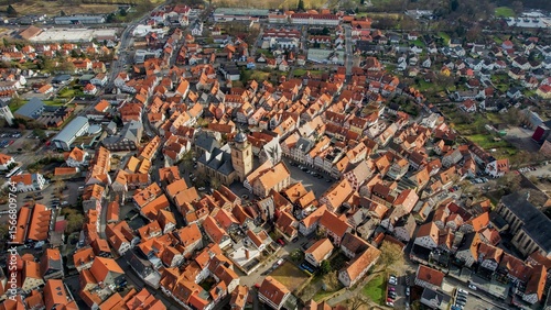 Fototapeta Naklejka Na Ścianę i Meble -  Aerial view of the downtown of the city Alsfeld, 36304 in Germany on a sunny afternoon in autumn