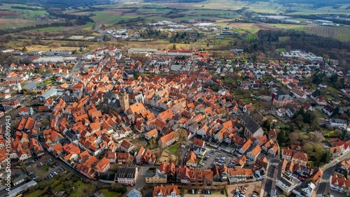 Fototapeta Naklejka Na Ścianę i Meble -  Aerial view of the downtown of the city Alsfeld, 36304 in Germany on a sunny afternoon in autumn