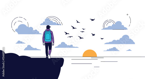 A lone traveler stands on a cliff edge gazing at the rising sun over the ocean accompanied by a flock of birds in the sky