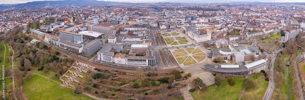 Fototapeta premium Aerial view of the downtown around the city Kassel in Hessen, Germany on a cloudy day. in autumn