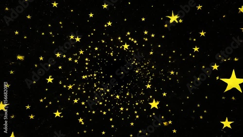 Festive digital motion background with massive cloud of bright yellow sparks spinning in a whirlwind in a dark space