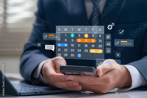 Time management and digital workflow concept. Businessman using smartphone calendar app to manage task, plan schedules, set reminder and track productivity with AI automation helping monitor progress.