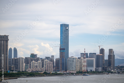 China Xiamen The Skyline of a Modern City with Towering Skyscrapers and a Calm Waterfront