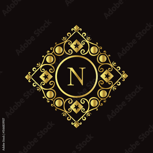 Luxurious golden letter N emblem with decorative diamond frame and black background for premium design  
