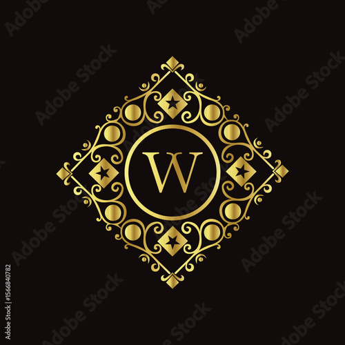 Luxurious golden letter W emblem with decorative diamond frame and black background for premium design  

