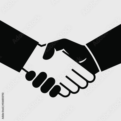 Two hands shaking in a business agreement or partnership