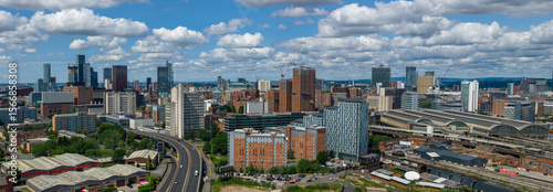 Obraz na plátně Aerial panorama of Manchester cityscape featuring Mancunian Way and the Piccadilly Train Station