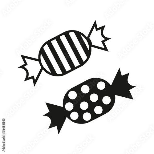 Two black candies with white patterns candy sweet