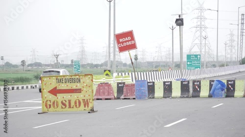 Road Work Ahead - Diversion Signs and Barriers on Intersection