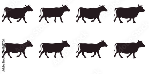 Silhouetted cows are moving slowly above and below a floral pattern border isolated