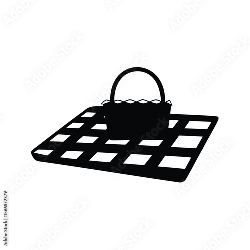 Monochrome illustration of a picnic basket placed on a checkered blanket