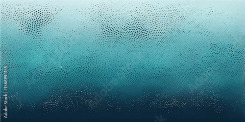 Blue water drops on glass create an abstract, wet texture, perfect for a natural rain or sea-inspired backdrop