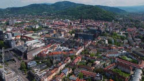 Aerial panorama view around the old town of the city Freiburg im Breisgau on a sunny summer day in the Germany.