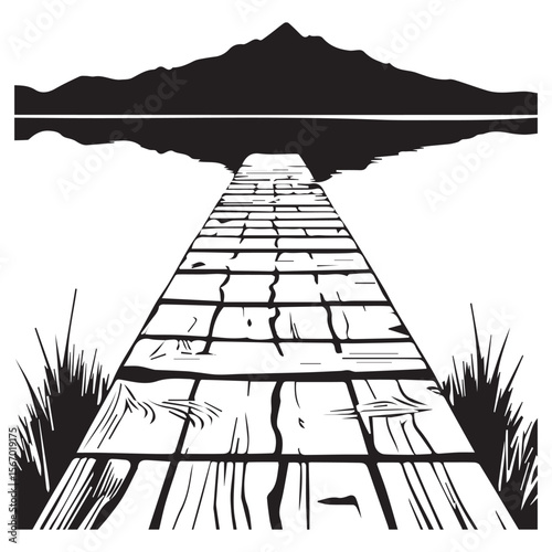 Wooden pier leading to a tranquil lake with a mountain silhouette reflection