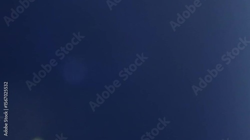 Abstract dark blue background with light leak effect for overlays