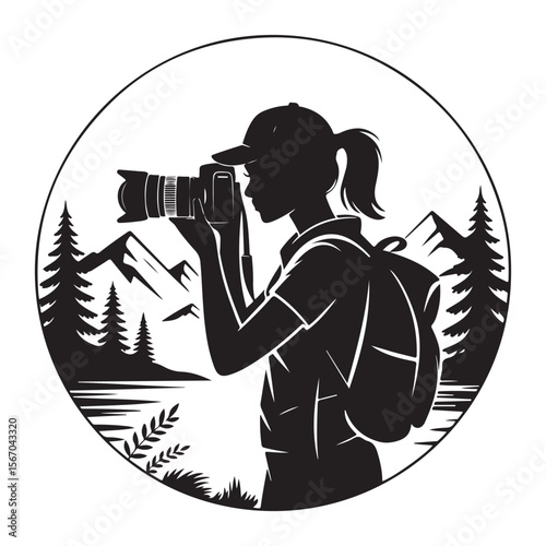 Silhouette of a female photographer with a backpack capturing a scenic mountain landscape with pine trees and a lake