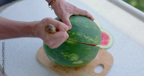 Man Slicing a Stunning Green Watermelon in Half to Reveal Inside | 4K Slow Motion