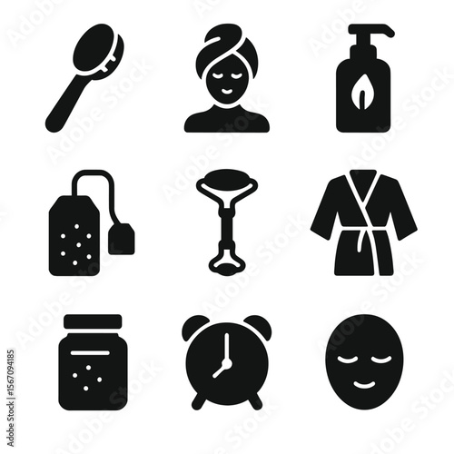 Self-Care Icon Grid. Solid, filled icon set of self-care rituals: face brush, hair wrap, body lotion, bath tea, jade roller, silk