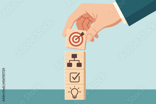 Business strategy and goal setting concept. Hand stacking wooden blocks with icons. Metaphor for project management, action plan, development, and reaching the target. Steps to success.