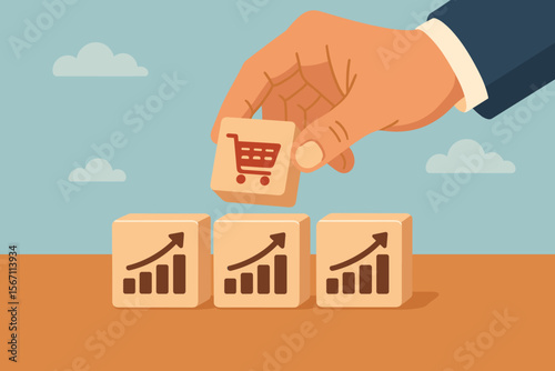 Businessman hand building with blocks. Shopping cart icon over growing graph symbols. Sales volume increase, e-commerce strategy, business growth, investment and profit concept.