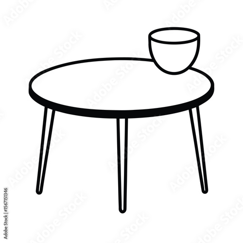 round coffee table with a teacup on top  black line at