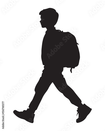 silhouette of a boy walking with a school bag or backpack