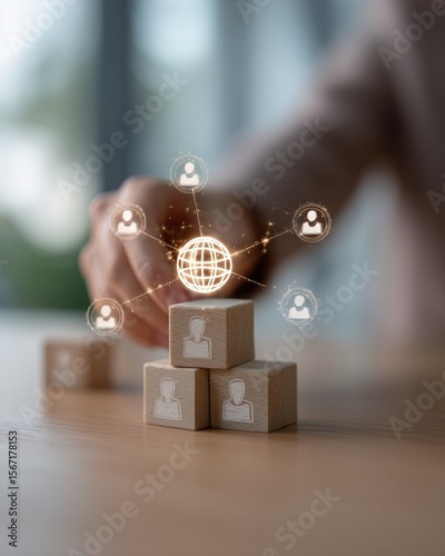 Wooden blocks with people icons connected to a globe icon