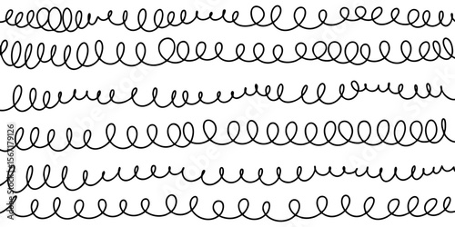 hand drawn spiral lines in black on white background. Abstract squiggle loops and curly strokes create a playful, dynamic texture.