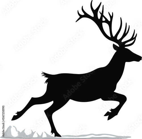 Majestic silhouette of a running reindeer in winter