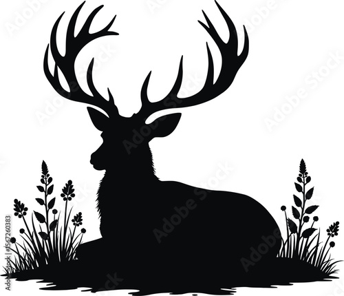 Majestic deer silhouette resting in wildflowers