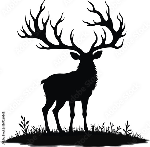 Majestic stag silhouette in grassland